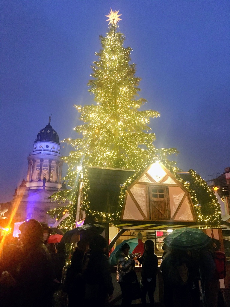 large christmas tree with lights on the Gendarmenmarkt in Berlin